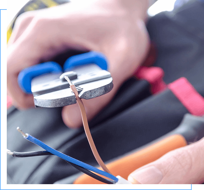 A person holding a pair of blue pliers